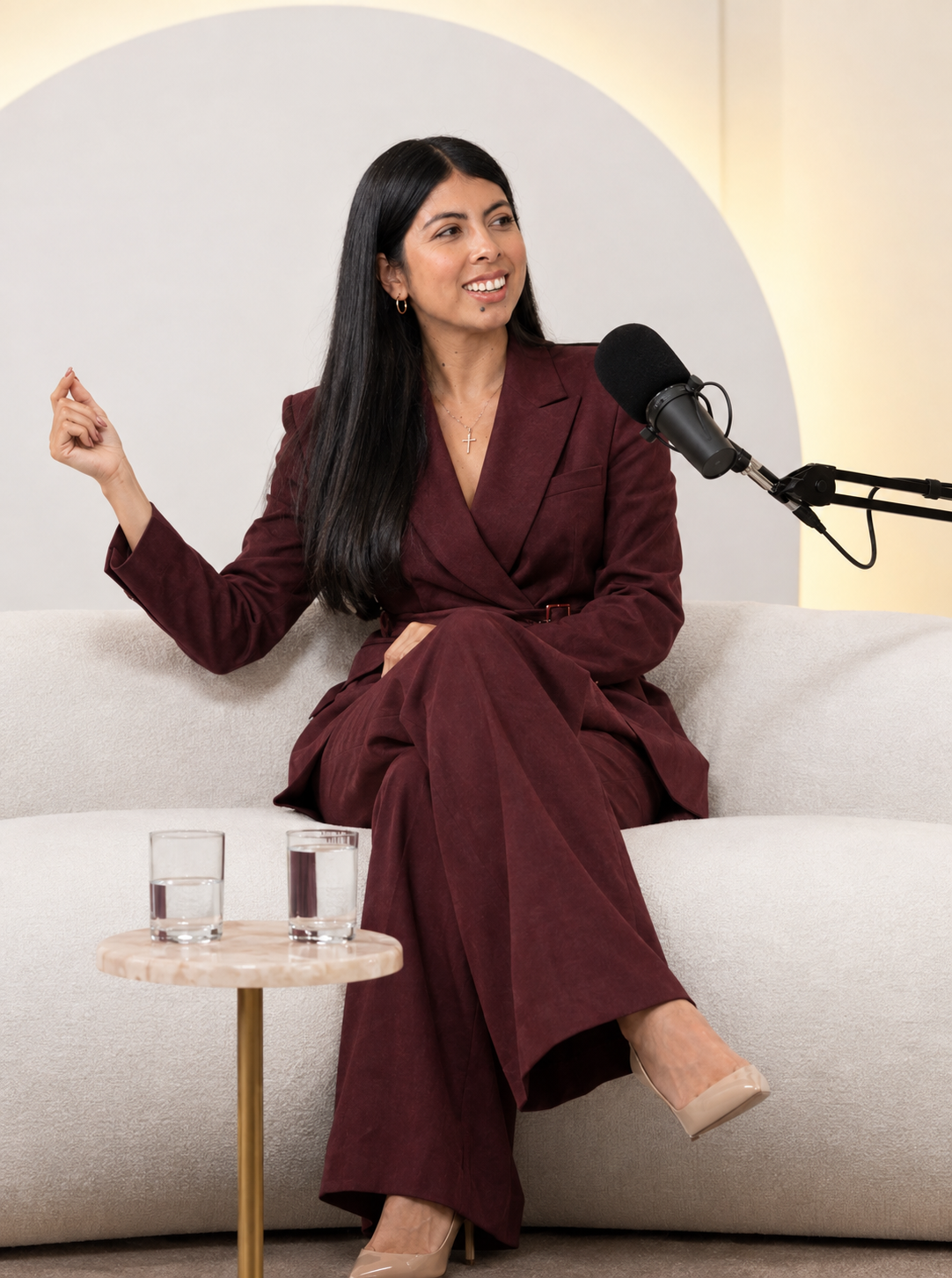 Daniela Galindo speaking into a microphone